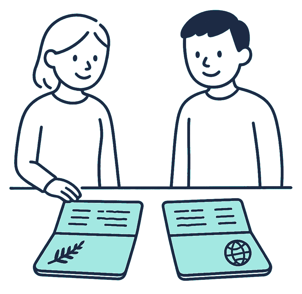 Two matching bank passbooks lie side by side on a counter, one stamped with a small fern leaf and the other with a small globe outline
