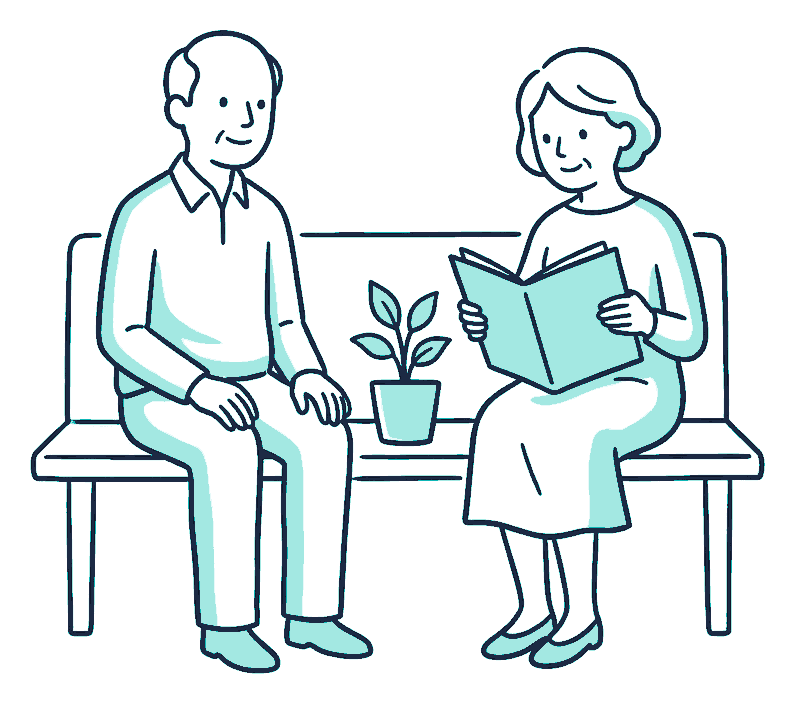 An older couple sitting together reading a policy document