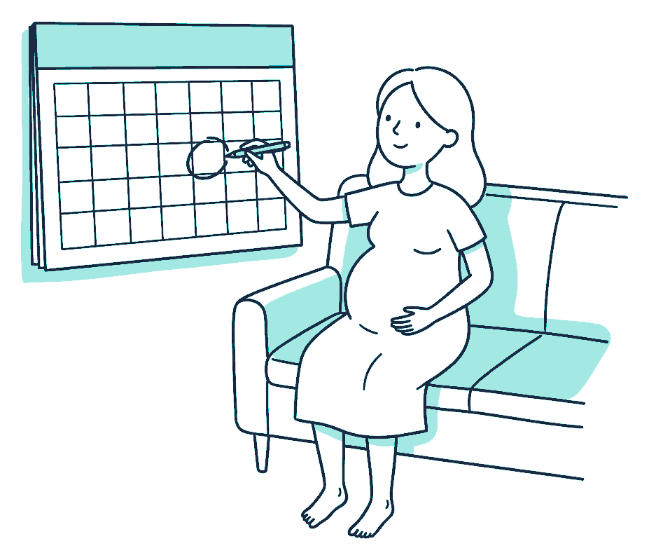 A pregnant person sits on a sofa circling a date on a large wall calendar with a pen