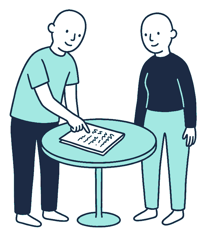 An adviser leans across a small table, tracing a finger down a page covered in squiggly scribble lines