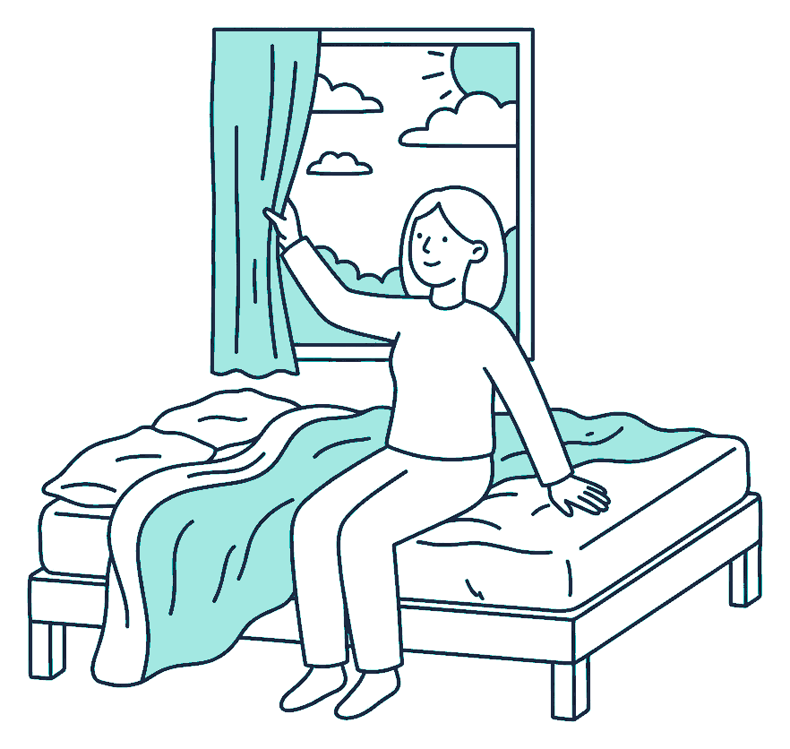 A person sits on the edge of an unmade bed at dawn, pulling one curtain half open