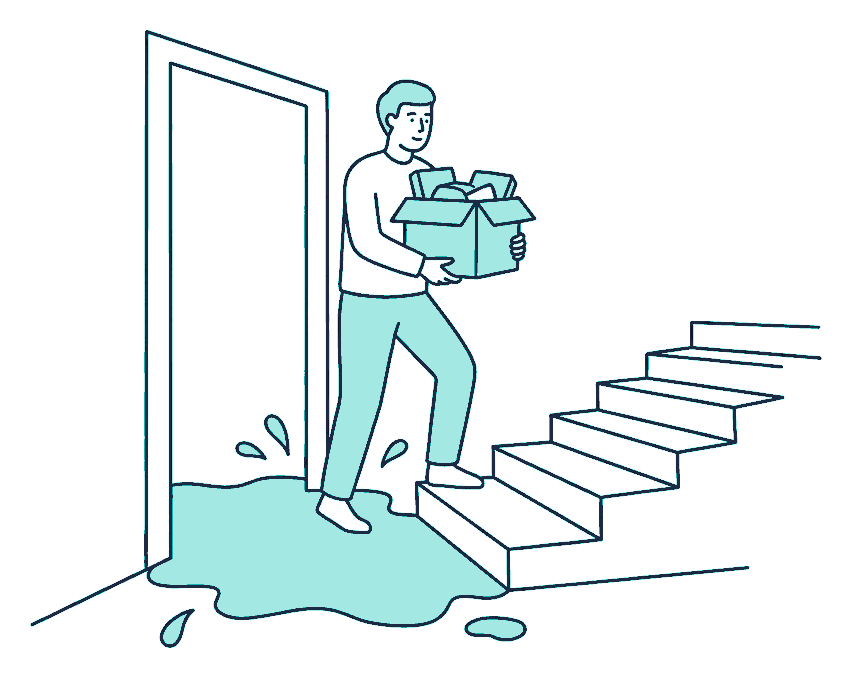 A tenant carries a rescued box of belongings up an outdoor stairway as water pools across the doorway below