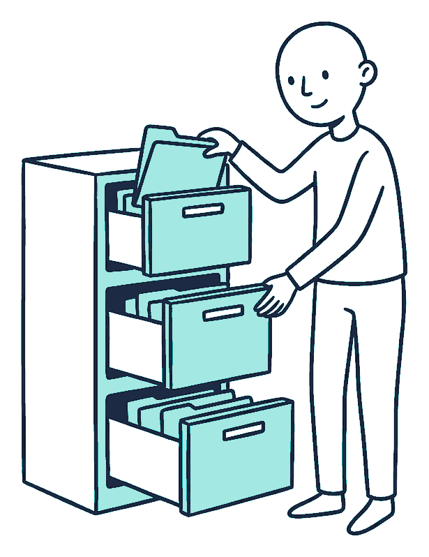 A person lifting a folder from a filing cabinet with drawers pulled out unevenly