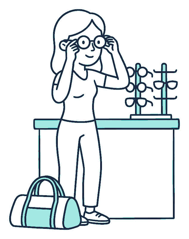 A woman tries on new glasses at an optical counter while a gym bag rests at her feet