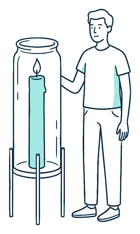 A person beside a tall candle burning steadily inside a glass jar